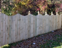 Solid Privacy Fence with Concave Scallop Gothic Post Tops