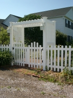 Arbor with arched spaced picket double Gate