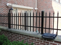 Picket Top on Masonry Wall EFS-10 with Quad Finials